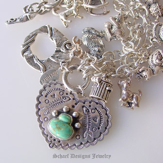 Schaef Designs Turquoise Cat Paw Print Heart Cat Fancy sterling silver charm bracelet |  pet lovers jewelry | upscale collectible Southwestern, Native American, Equine, & turquoise jewelry gallery | Schaef Designs artisan handcrafted, southwestern & turquoise Jewelry | New Mexico 