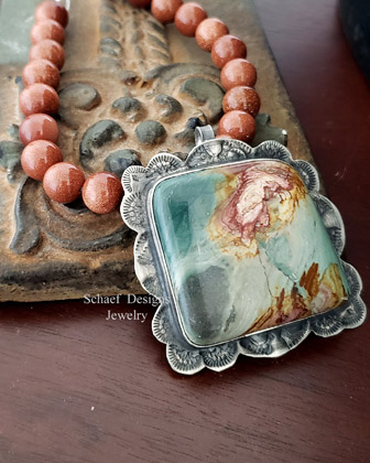 Warren Nieto Santa Domingo Inlaid Turquoise & Coral Hand Pendant on leather necklace  | Arizona 